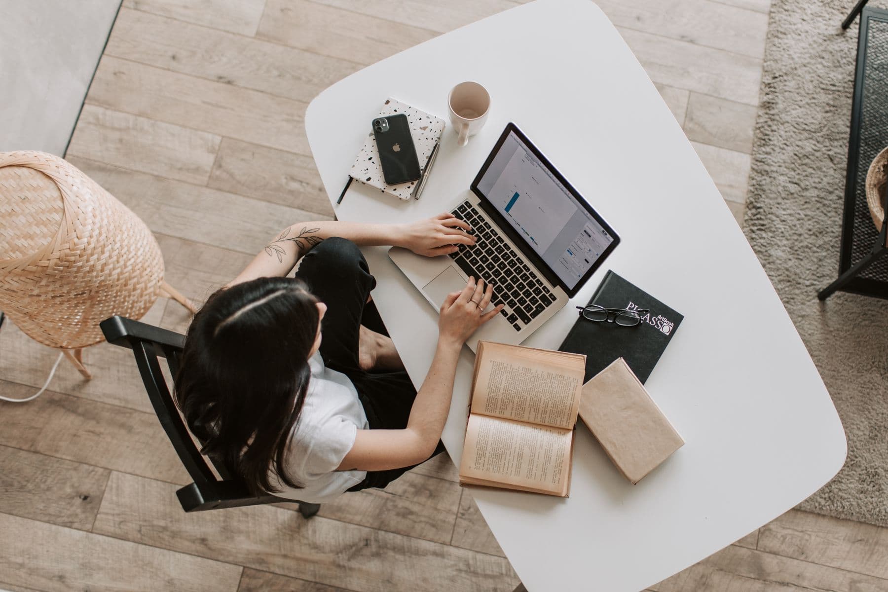 Person working from a home desk — illustrative of a home office